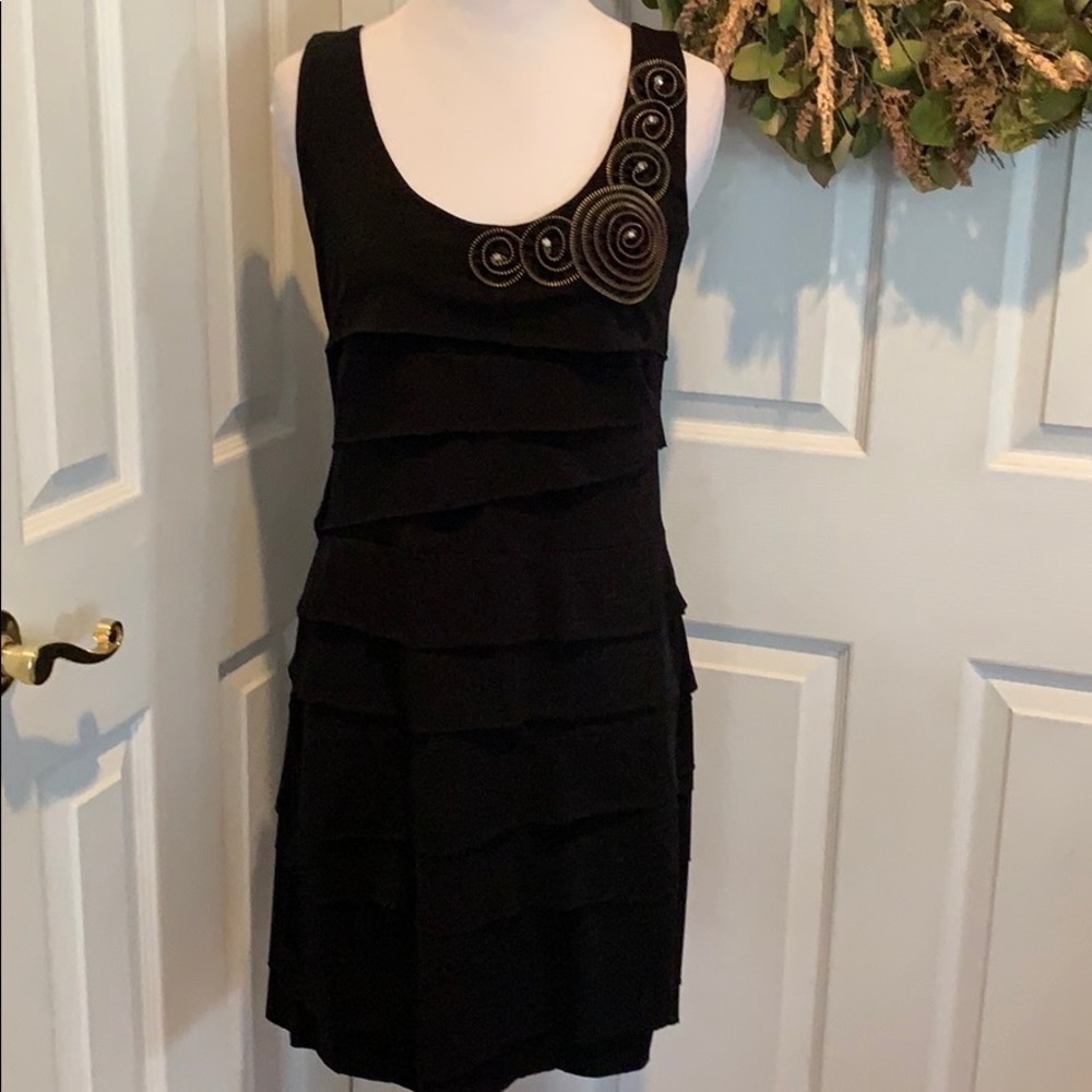 Black tank ECI dress with gold accents
